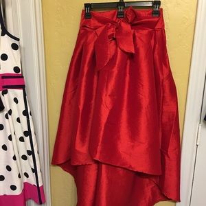 Red high low skirt